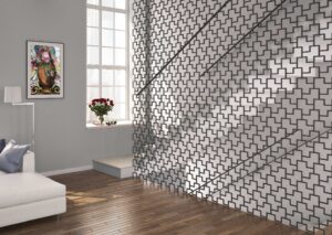 pared de metal forjado con formas geométricas